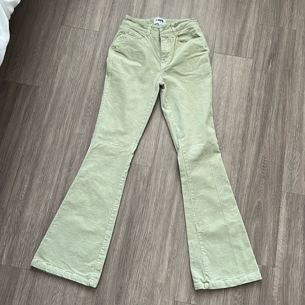 green corduroy flare pants